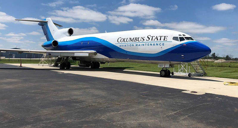 Boeing 727 on tarmac.