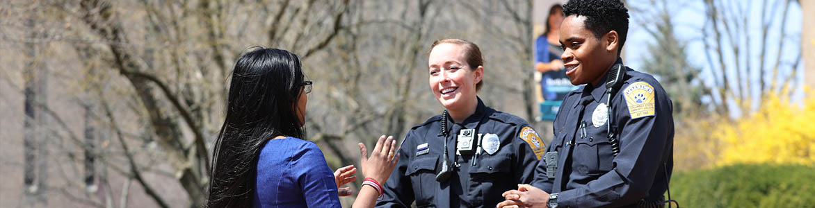 Officers talking to student