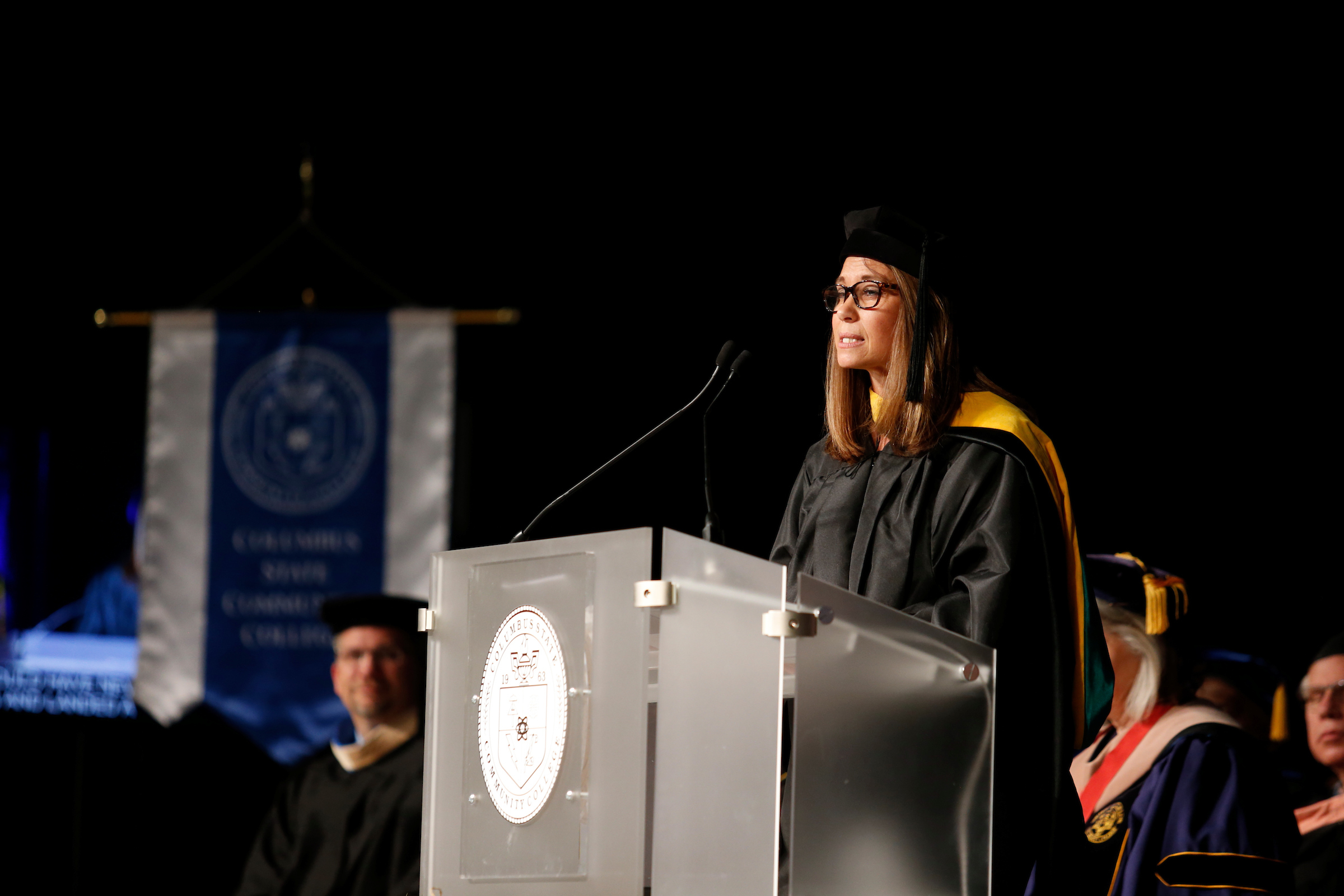 Merideth Sellars speaking at graduation.