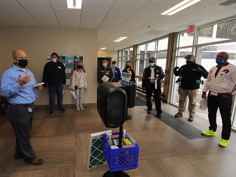
On the left, Mark Dudgeon, Facilities Management senior director, talks to faculty and staff on a tour of the Columbus Campus in the spring of 2021.
