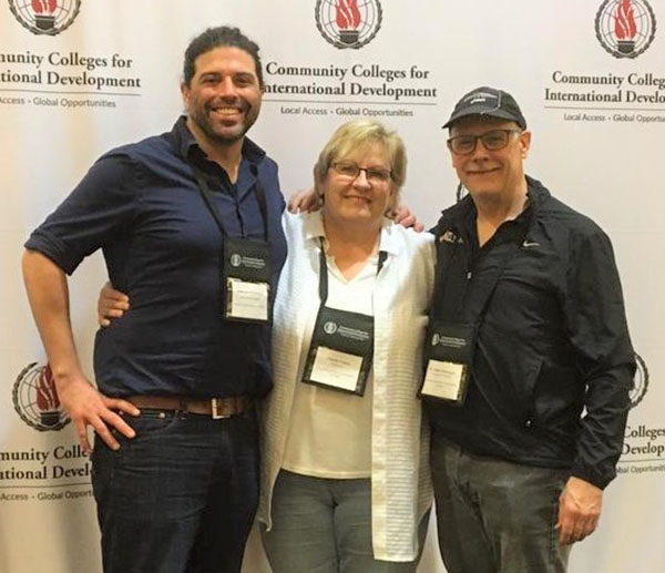 Andy Woodmansee, instructor of Languages and Communication, Charla Fraley, professor of Business Programs, and Paul Carringer, marketing professor